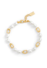 Bracelet doré avec des perles ovales et des accents en forme de fer à cheval. Comprend un fermoir avec une chaîne et une étiquette de marque.