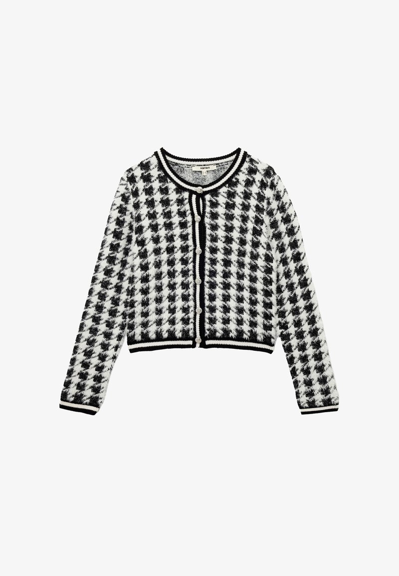 Schwarzweißer karierter Cardigan mit einem Hahnentrittmuster, kürzerer Länge, runder Halslinie und schwarzem Abschluss mit Knopfverschlüssen.