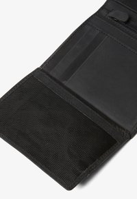 Black leather wallet with a textured interior, multiple card slots, and a zippered compartment. Compact, functional design.