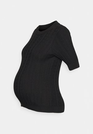 Top de maternidade preto, de manga curta, com textura canelada e padrões verticais, projetado para se ajustar sobre uma barriga arredondada. Tecido suave e flexível.