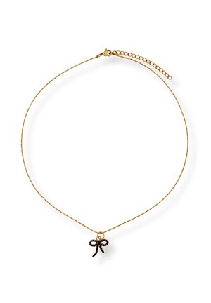 Delicate gold chain necklace with a small black bow-shaped pendant and adjustable clasp closure.
