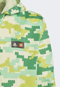 adidas Sportswear LEGO® PLAY - Mezisezónní bunda  - core green   halo