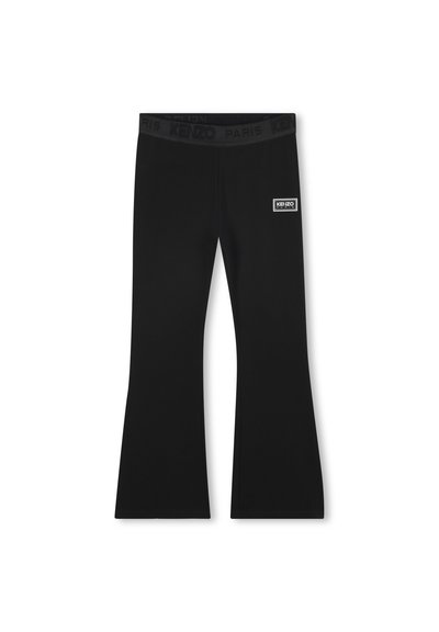 Leggings neri a zampa d'elefante realizzati in materiale elastico. Presentano una vita con marchio "KENZO PARIS" e una piccola toppa con logo sulla coscia.