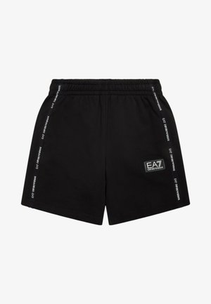 Pantaloni corti neri realizzati in un tessuto morbido con una cintura elastica, con branding laterale in testo bianco e una patch con il logo sulla gamba sinistra.