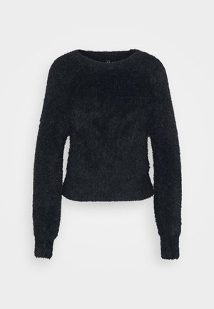 Svart, kort genser med lange ermer, laget av mykt, lodden materiale. Har rund hals og ribbestrikkede mansjetter og kant.