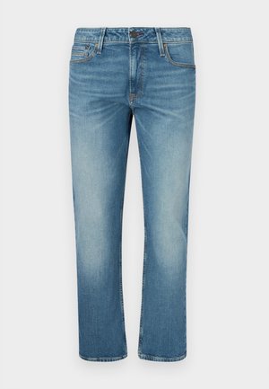 Jean bleu clair en denim. Coupe droite avec texture délavée, style à cinq poches et fermeture à bouton.