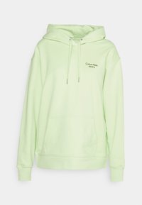 Lichtgroene Calvin Klein Jeans hoodie met voorzak, verstelbare capuchon met trekkoord, geribbelde boorden en logo op de borst en mouw.