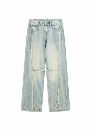 Light blue denim jeans with a loose fit, featuring frayed seams, patchwork design, and a classic five-pocket style.
