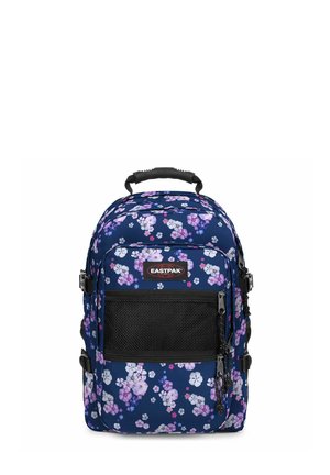 Navy blue backpack with pink and white floral pattern, black mesh front pocket, sturdy handle, and Eastpak logo on the front.