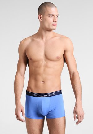 Blaue Baumwoll-Boxershorts mit einem dunkelblauen Gummibund, der das Logo "Polo Ralph Lauren" trägt, eng anliegend und mit glatter Textur.