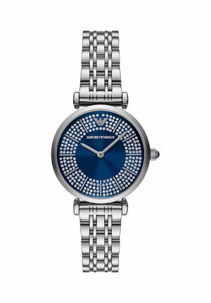 Zilverkleurig metalen schakelarmbandhorloge met blauwe wijzerplaat, kristallen versieringen rond de markers en zilverkleurige wijzers die 10:10 aangeven.