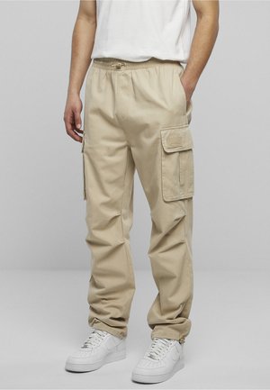 Karl Kani RUBBER SIGNATURE PANTS UNISEX - Reisitaskuhousut - beige