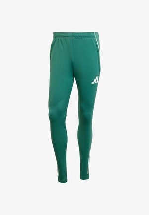 Leggings deportivos verdes fabricados en un tejido elástico, con un corte ajustado, cinturilla elástica, bolsillos laterales y acentos de logotipo en blanco.