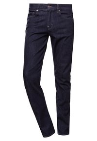 Tummansininen farkkuhousut slim fit -mallissa, joissa on viisi taskua, vyölenkit, nappikiinnitys ja kontrastiväriset ompeluyksityiskohdat.