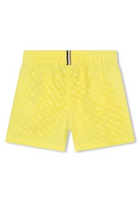 Costumi da bagno gialli con un motivo testurizzato, cintura elastica con una striscia bianca e nera, e un taglio corto.