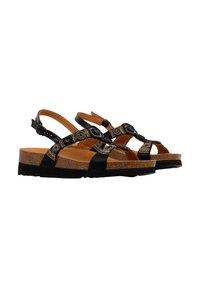 Sandalia negra con suela de corcho, con acentos trenzados y hebilla ajustable. Punta y talón abiertos, detalle de superficie texturizada.