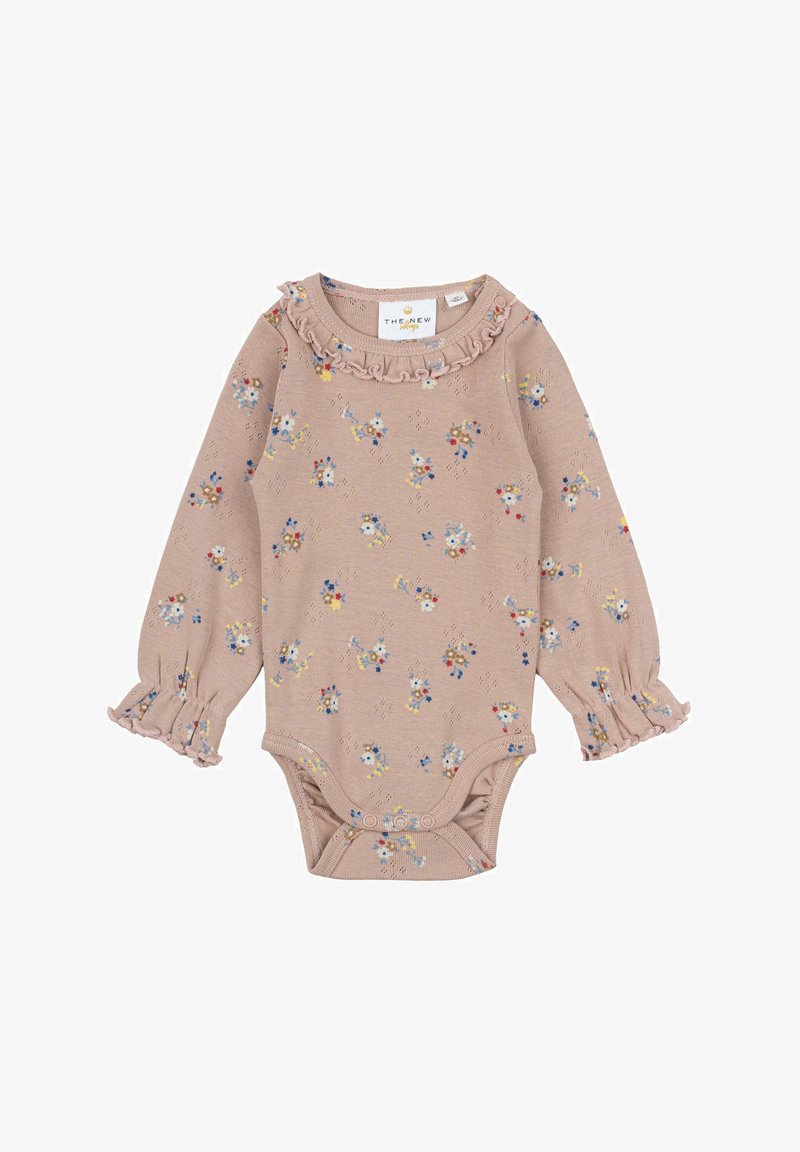 Detský body s dlhým rukávom v svetloružovej bavlnenej farbe s kvetinovou potlačou, s volánikovým výstrihom a volánikmi na manžetách. Zapínanie na patentky na spodnej časti.