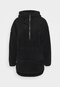 Sort fleece hættetrøje med halv-zip foran og stor kengurupose, der har en afslappet pasform og buet kant.
