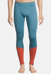 Leggings da uomo in un design a blocchi di colore blu e arancione. Realizzati in un tessuto liscio e leggero, con una silhouette aderente e cuciture piatte.