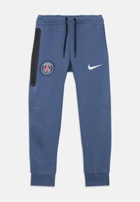 Blaue Paris Saint-Germain Jogginghose mit elastischem Bund, schwarzen Kordeln, seitlichem Reißverschlussfach und weißem Nike-Logo am rechten Bein.