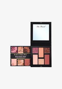 Mini-oogschaduwpalet met warme tinten, acht kleuren in verschillende texturen, waaronder mat, glans en glitter, met een spiegel.