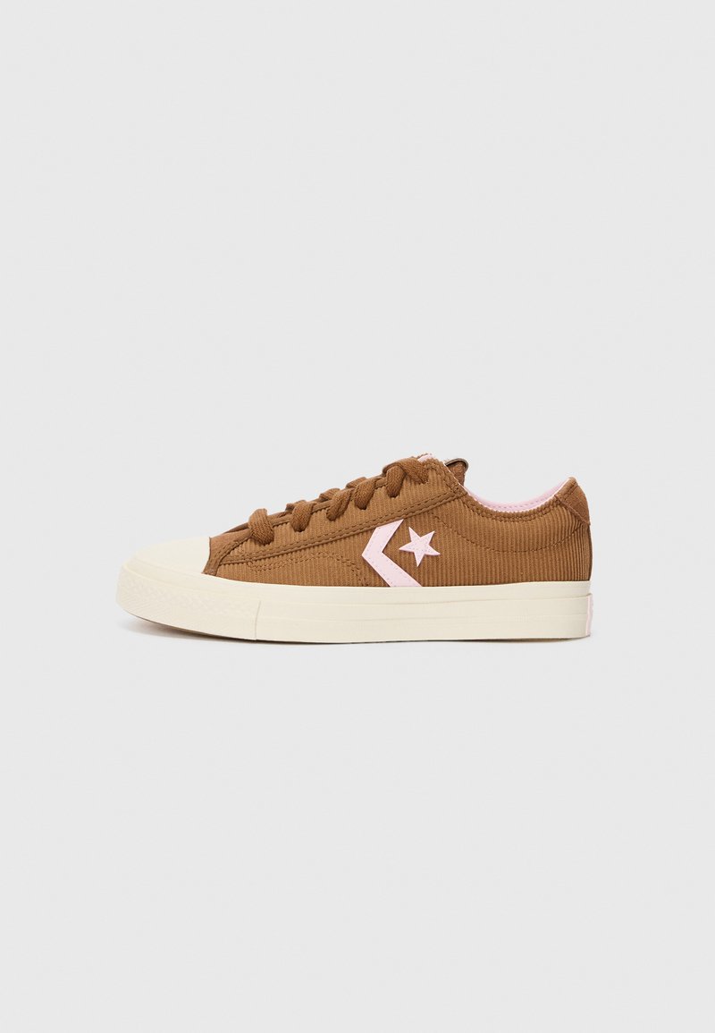 Brown corduroy sneakers with a cream rubber outsole, pink star logo, and lace-up closure. Features a textured upper and rounded toe.