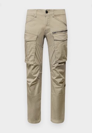 Pantalones cargo beige hechos de una mezcla de algodón, con múltiples bolsillos, un bolsillo con cremallera en el muslo y diseño de pierna recta.