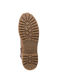 Bruine wandelschoen zool van duurzaam rubbermateriaal. Beschikt over diepe profielen en kruismotieven voor grip. Inclusief "Travelin"-branding.