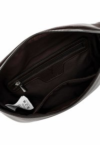 Rudos odos krepšio vidus su užtrauktuku kišenėje, lygiu paviršiumi ir audinio pamušalu. Yra žymė ir kontrastinės siūlės.