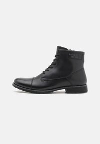 Schwarze Leder-Ankle-Boots mit runder Zehenpartie, Schnürverschluss und strukturiertem Gummisohle. Verfügt über dezente Markierung an der Seite und genähte Akzente.