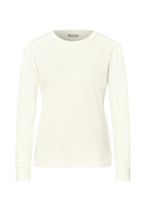 Biała koszula z długim rękawem i okrągłym dekoltem, wykonana z bawełny. Posiada marszczone detale na szwach ramion oraz dopasowane mankiety. Gładka tekstura.