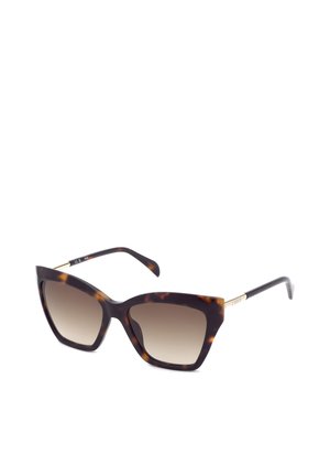 Lunettes de soleil œil de chat en écaille avec verres marron dégradés et branches fines noires et dorées sur fond blanc.