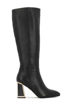 Knee-high black leather boot with a pointed toe and gold-accented geometric block heel, featuring smooth texture and sleek design.