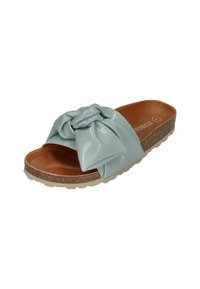 Light blue patent slide sandal with a knotted bow detail, cork sole, and brown cushioned footbed; smooth texture and open toe design.