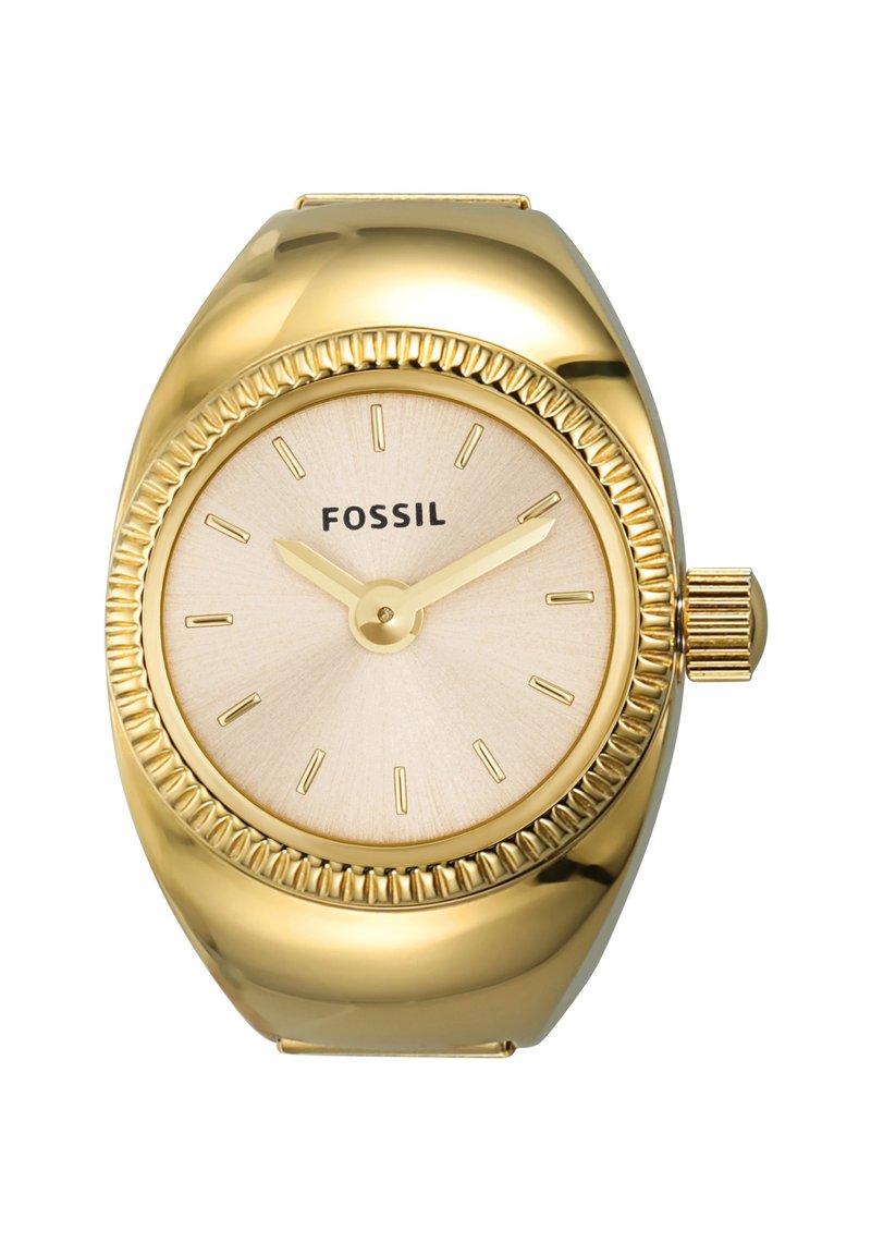 Montre Fossil dorée avec un cadran texturé blanc cassé, de fins marqueurs d'heure et une couronne. Présente un boîtier arrondi avec une lunette striée.