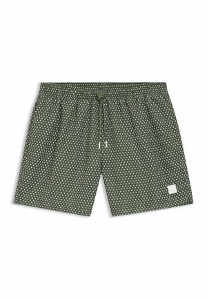 Zielone krótkie spodenki kąpielowe z elastycznym pasem, sznurkiem do ściągania i wzorem diamentowym, z małą białą etykietą po prawej stronie na dole.