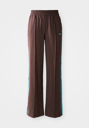 Brown athletic pants with a ribbed texture, elastic waistband, and turquoise side stripes. Features the adidas logo on the front.