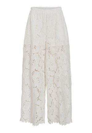 Culottes en dentelle blanche avec un motif floral, taille élastique et une coupe large. L'ourlet présente un bord festonné pour un détail supplémentaire.