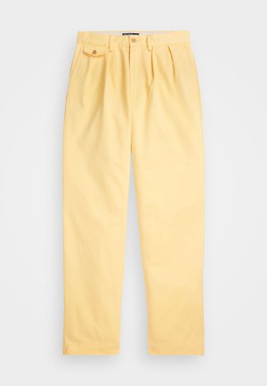 Pale yellow, lightweight cotton trousers with a relaxed fit, pleated front, and a single back pocket with a button closure.
