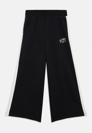 BAGGY GIRLS - Tracksuit bottoms - true black