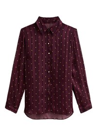 Blusa lunga color maroon con pois dorati, colletto a punta e chiusura con bottoni sul davanti, su uno sfondo bianco.