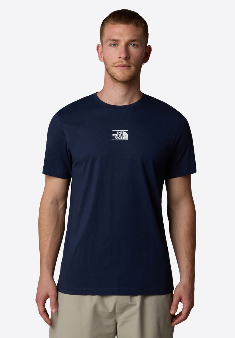 Mørkeblå kortærmet T-shirt i bomuld med et hvidt North Face-logo på brystet. Rund halsudskæring; glat tekstur.