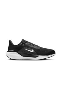 Baskets de sport noires avec une tige en mesh, un swoosh Nike blanc et une semelle texturée. Elles disposent d'un semelle intermédiaire rembourrée et d'un système de laçage.