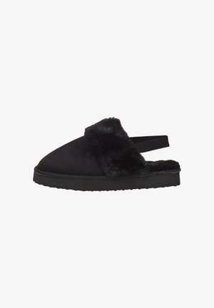 Mocassin en suede noir avec une sangle en fausse fourrure douce et une semelle en caoutchouc solide. Caractéristiques : un bout arrondi et un design ouvert à l'arrière.