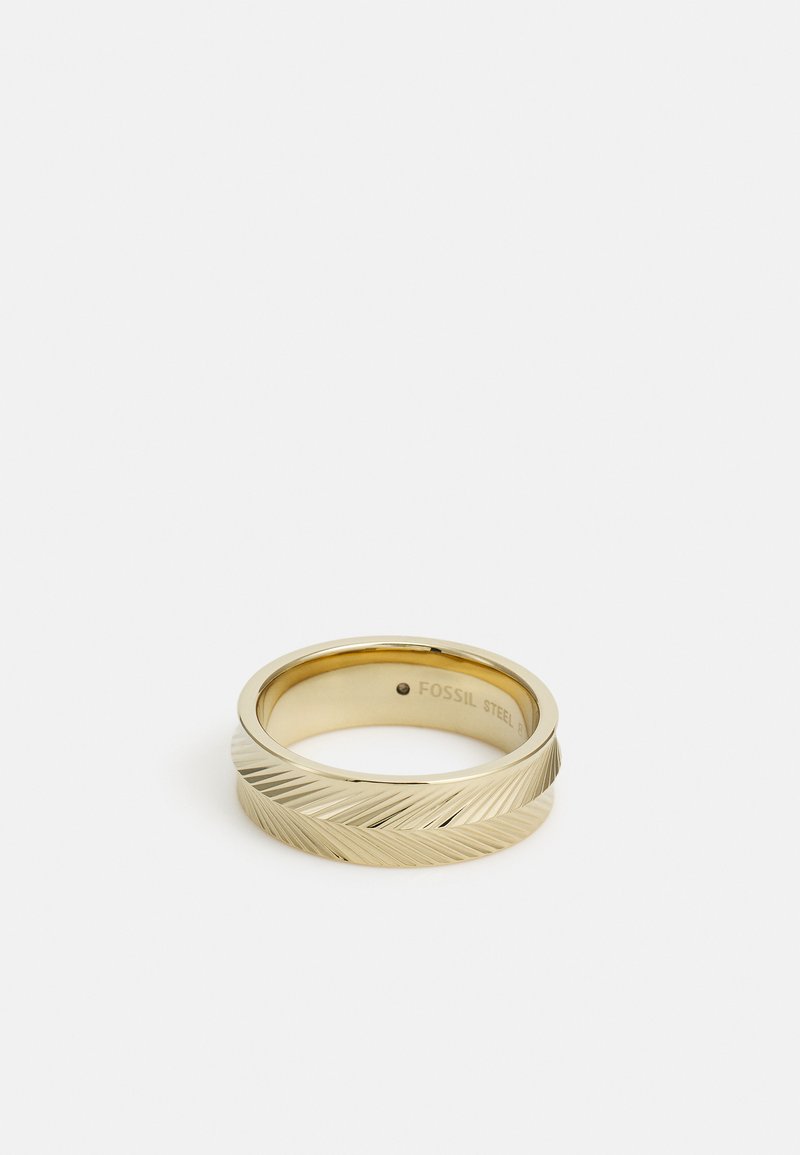 Gold-colored ring featuring a twisted design with a textured surface and engraved accents, made from stainless steel. Interior marked "FOSSIL STEEL."