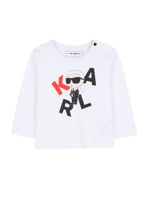Witte longsleeve t-shirt van katoen met een cartoon ontwerp van een figuur in een zonnebril, met de letters K, A, R, L in rood en zwart.