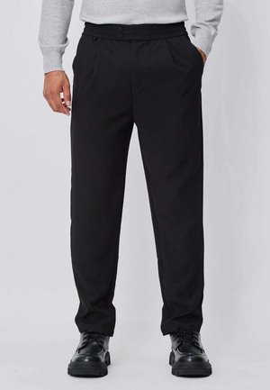 CHIC AVEC POCHES LATÉRALES - Pantalon classique - noir