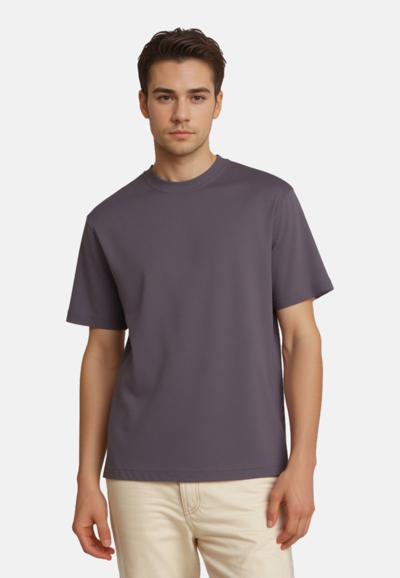 Purple short-sleeve t-shirt with a round neckline, made of a smooth, lightweight fabric; features relaxed fit and minimal design.