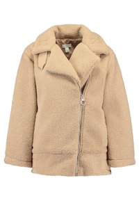 Beige fleecejakke med en blød tekstur, bred krave og asymmetrisk frontlynlås. Har et cropped design og sidelommer.