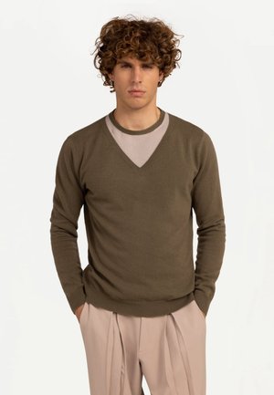 Stickad tröja - green